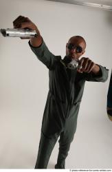 ERIC STANDING POSE WITH GUNS